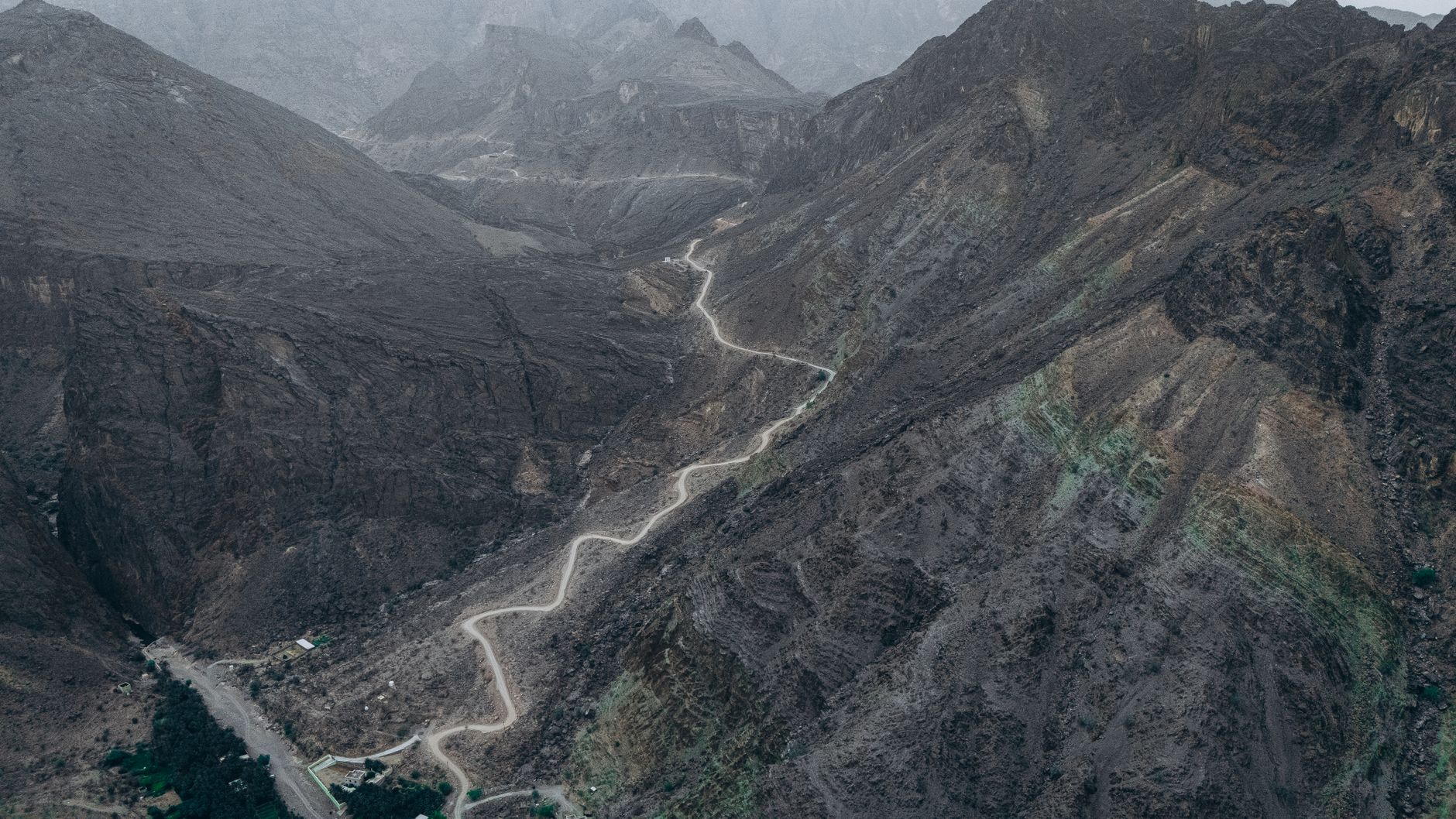 Mountain ridges folding into the distance in northern Oman
